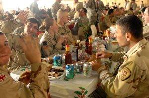 3rd Infantry Division soldiers and Iraqi interpreters share Christmas with their coalition forces from Republic of Georgia, Iraq 2005.